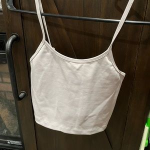 Tan balance athletics crop top. Never worn. Mint condition.